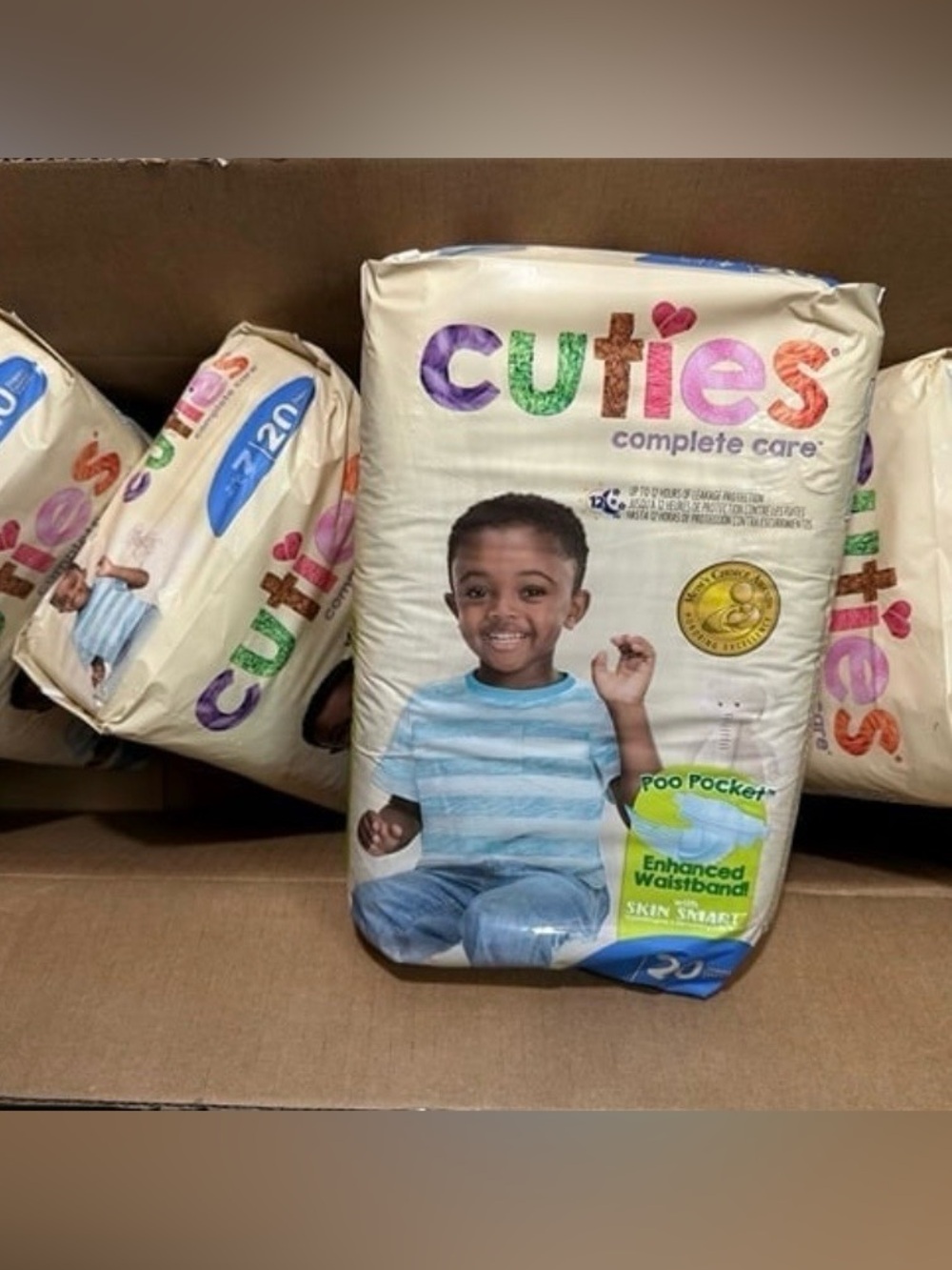 Cuties New 4 packs Complete Care Disposable Diapers Size 7 / 20 diapers